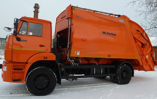 Мусоровоз с задней загрузкой McNeilus 16